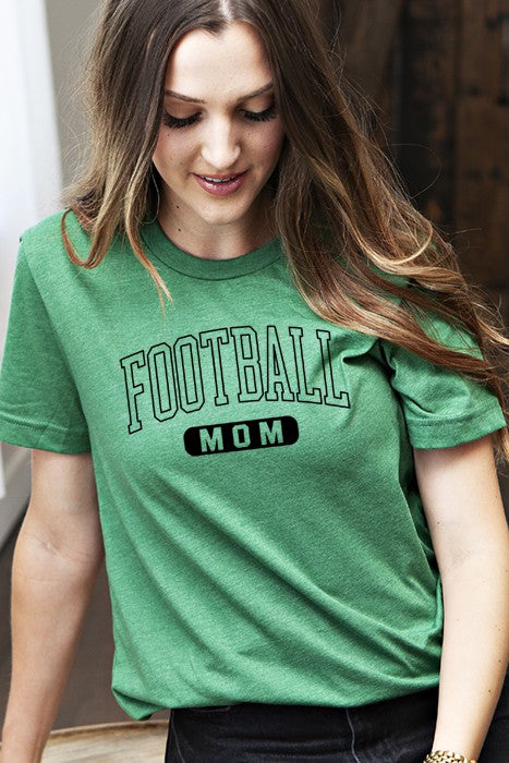 Woman wearing a green 'Football Mom' t-shirt.