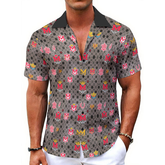 Man wearing a patterned shirt with colorful designs on a white background